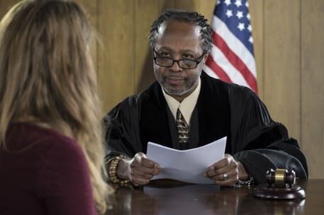judge reviewing personal injury claim